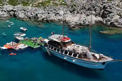 Rhodes: Gulet Trip with Food, Drinks, SUP, Kayak & Swimming