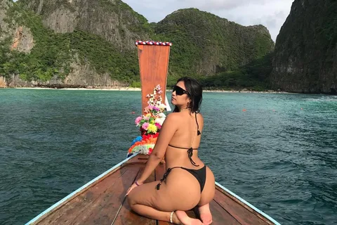 Phi Phi: 7 Islands longtail boat with Sunset and Plankton