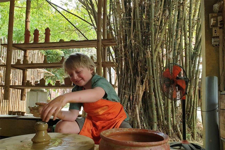 Experience making pottery w the locals in Thanh Ha Village