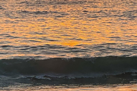 See the Sunrise in Copacabana from a Stand Up Paddleboard with Photos
