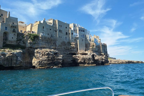 Coast and caves of Polignano:boat tours,drinks,swimming,music and fun Polignano coast and caves: boat tour, drinks, swimming, music, and fun