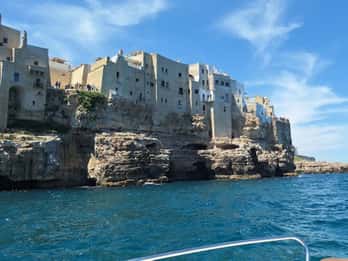 Coast and caves of Polignano:boat tours,drinks,swimming,music and fun