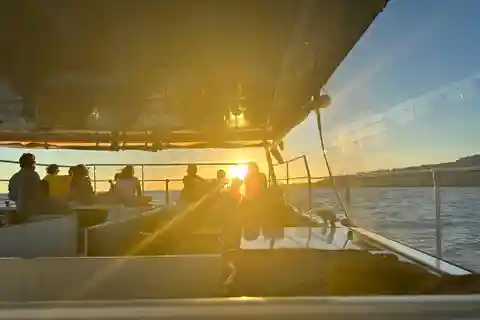 Portimao: Summer SUNSET Benagil Caves Tour | Eco Catamaran