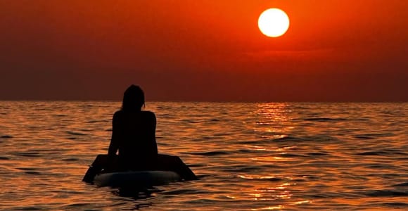 Ibiza: Sunset Paddleboarding Tour in Cala Vadella