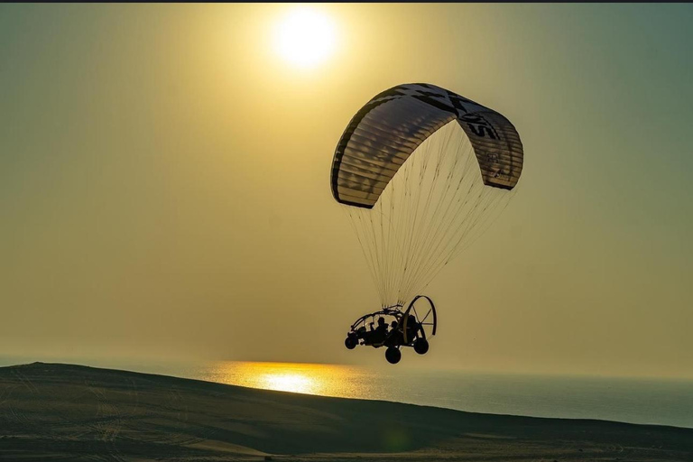 Doha: vuelo en paratrike sobre el desierto de Sealine con recogida