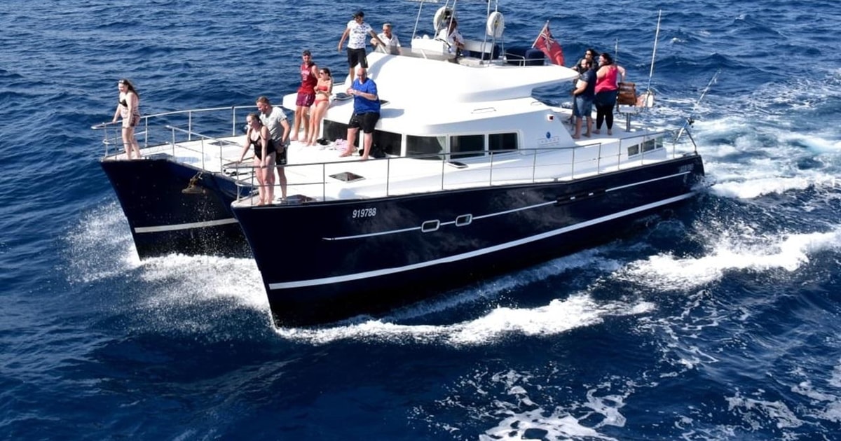 Benalmádena: Private Catamaran Charter for up to 12 People | GetYourGuide