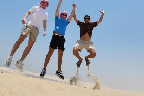 Doha: inland sea Tour With Dune Bashing &Sandboarding fun Doha: safari , camel ride, sandboarding hotel pickup