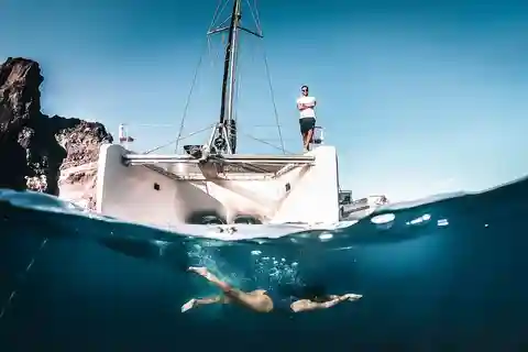 Santorini: All-Inclusive Private Catamaran Experience