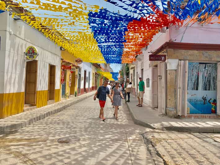 Private Pickup, Sightseeing Ride & Street Food Taste GetYourGuide