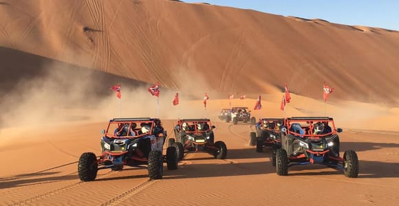 Doha Qatar Buggy ride, camel ride, dune bashing, sandboard.