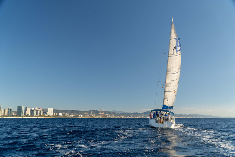 Barcelona: Sailing with Open Bar, Catalan Snack & Swim Stop