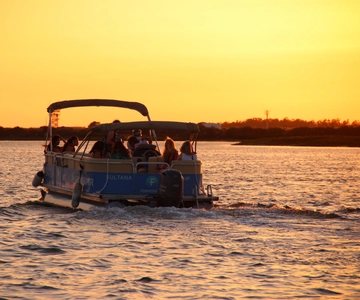 De Faro: Passeio de barco ao pôr do sol na Ria Formosa