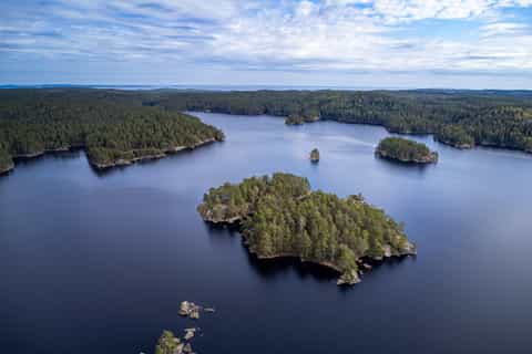 Skerries of the Stockholm Archipelago with red cottages