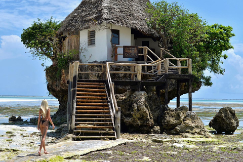 Zanzibar: laguna blu, ristorante sulla roccia, grotta e spiaggia