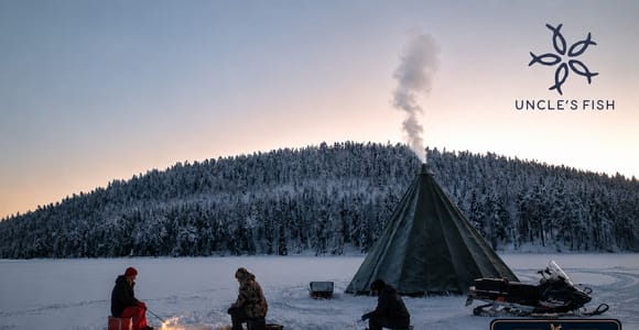 Rovaniemi: Ice Fishing, Snowmobile, and Net Fishing Tour