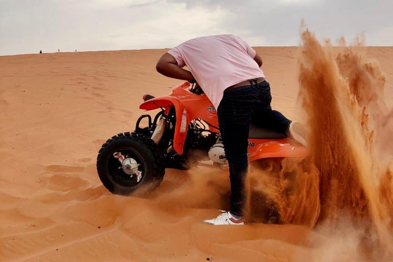 Aventure dans les sables rouges (balade en quad, balade à dos de chameau, maison du patrimoine)