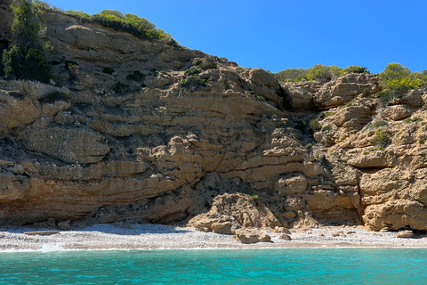 Trip to a hidden beach with crystal-clear water + snorkeling in Menorca