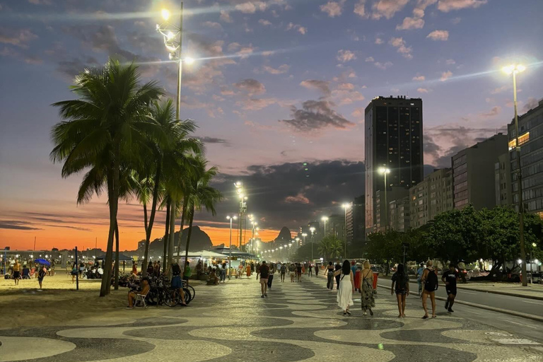 See the Sunrise in Copacabana from a Stand Up Paddleboard with Photos