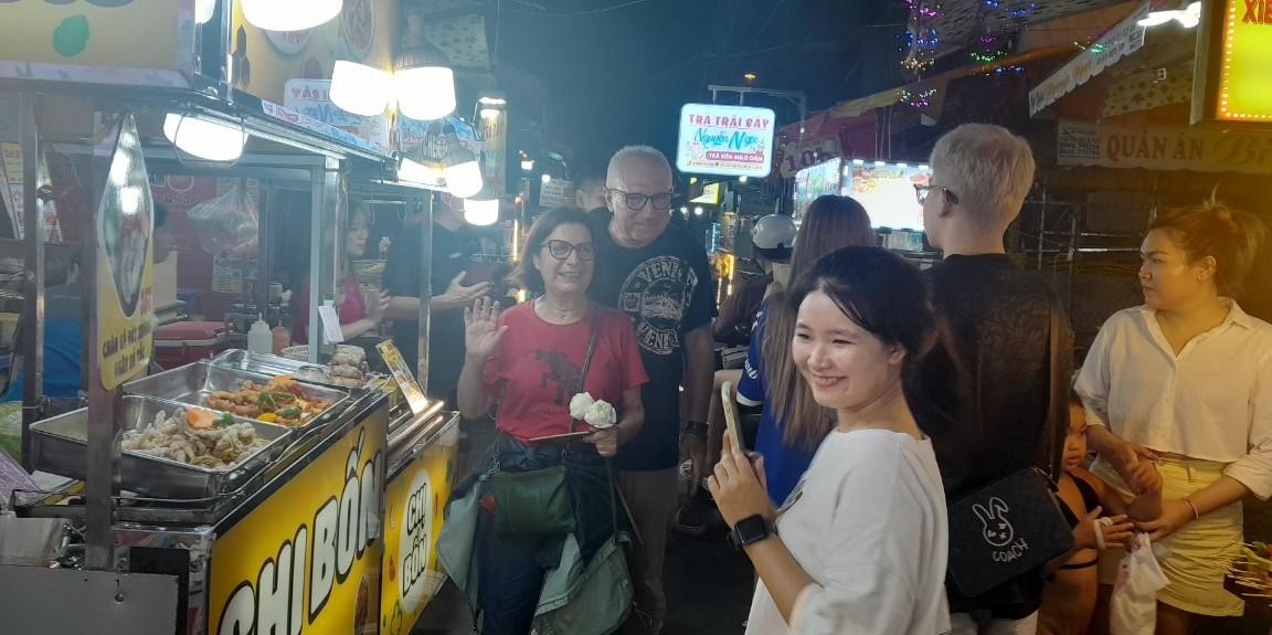 Taste Tops of Saigon Street Food by Scooter | GetYourGuide