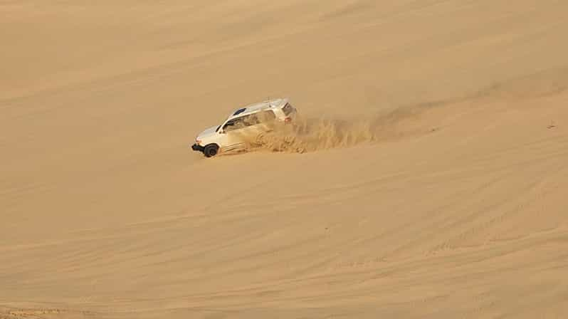 Doha: Desert Safari with Sandboarding and Inland Sea | GetYourGuide