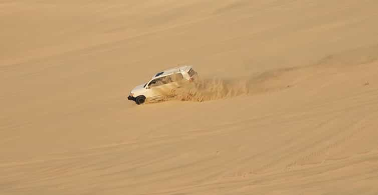 Doha: Desert Safari with Sandboarding and Inland Sea | GetYourGuide