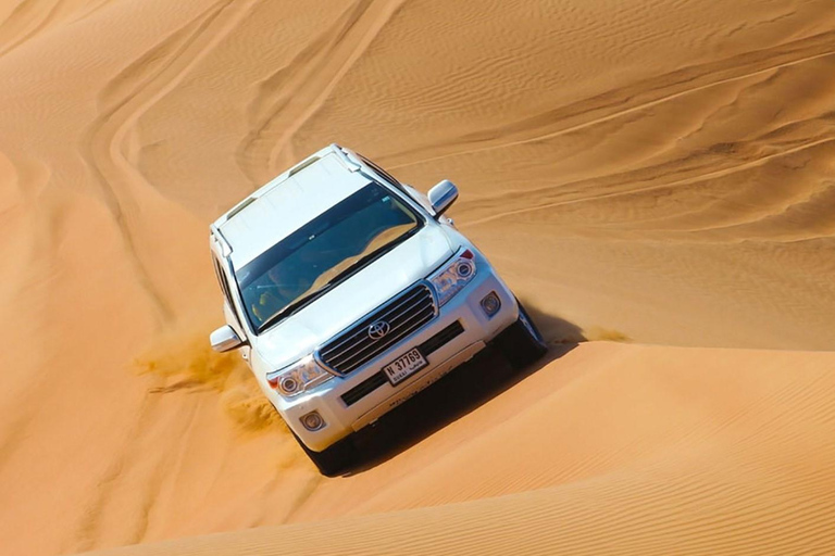 Safari por el desierto de Doha: Conducción en dunas, paseo en camello y Sandboarding