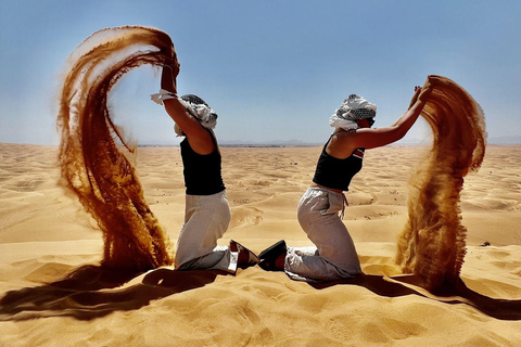 Safari a Doha con giro in cammello, sandboarding e falchiSafari a Doha con giro in cammello Sanboarding e falchi