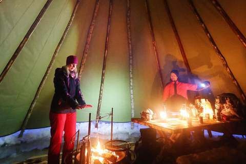 Rovaniemi: Ice Fishing, Snowmobile, and Net Fishing Tour