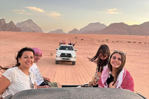 overnight: sleep under the stars in the cave in Wadi Rum Protected Area Caml tour