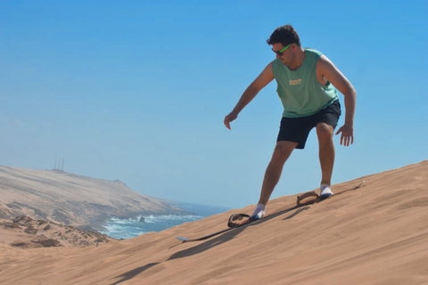 Sandboarding &amp; Kamelritt bei Sonnenuntergang mit Barbecue