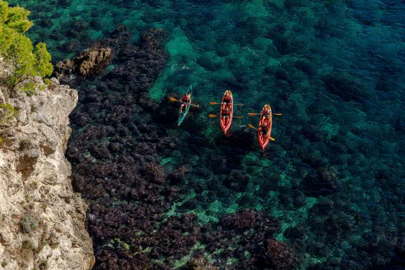 Dubrovnik: Passeio de caiaque durante o dia ou ao pôr do sol com mergulho com snorkel e lanche