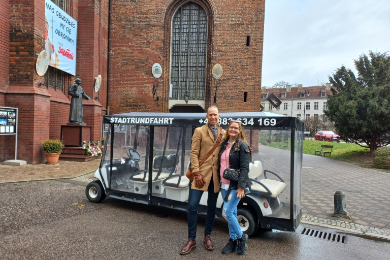 Gdańsk: Prywatna wycieczka po mieście wózkiem elektrycznym z przewodnikiem na żywoGdańsk: Zwiedzanie miasta z przewodnikiem w języku angielskim na żywo wózkiem elektrycznym