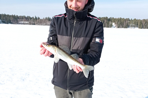 From Helsinki, Ice fishing experience with meal and drink.