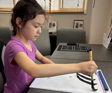 Tokyo: Esperienza di calligrafia giapponese con stampa di abiti