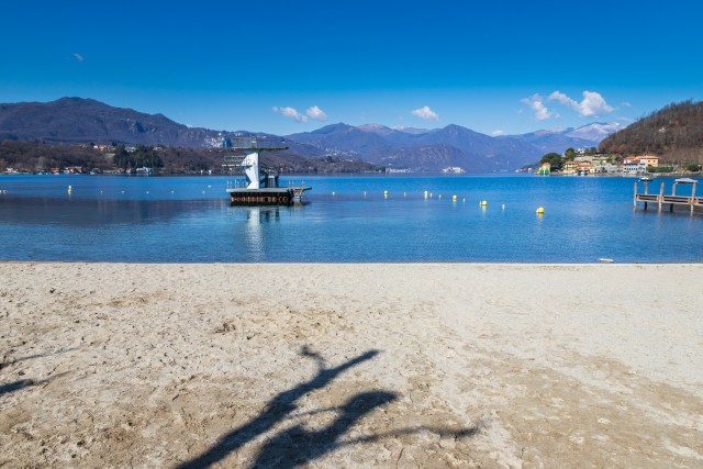 Visit Orta Lake a day at the beach with lunch in Elba Island