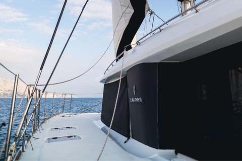 Mykonos: Prywatna wycieczka katamaranem o poranku lub o zachodzie słońca