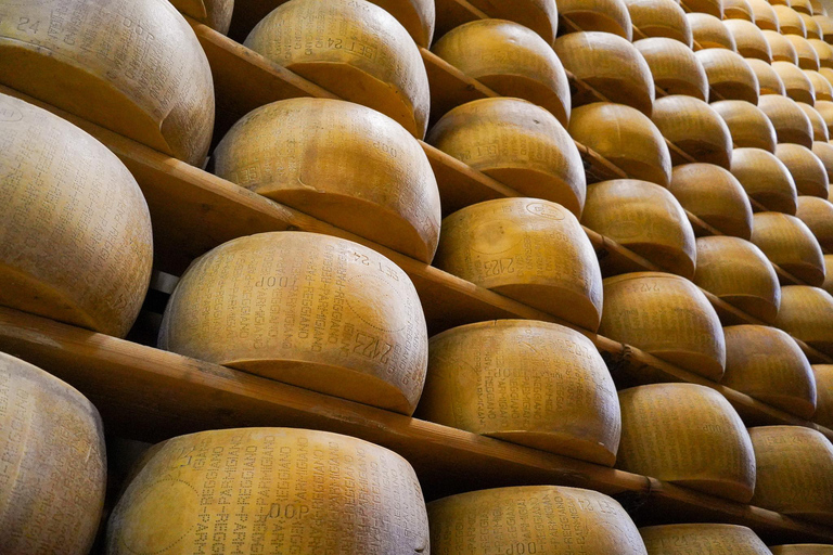 From Bologna: Parma, Parmigiano, and Prosciutto Tour by 1st-Class Train Parmesan and Prosciutto PDO Tour from Parma: a smart experience!