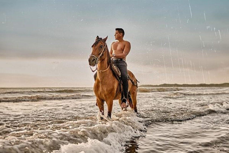 Horseback riding along the beaches of Cartagena at Sunset