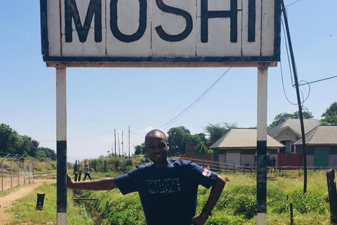 Moshi or Arusha: Guided Town Tour , Market and shopping By using- Tuku Tuku