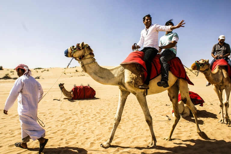 Dubaj: safari po czerwonych wydmach, jazda na wielbłądach, sandboarding i grillCzerwone wydmy, wycieczka prywatna z grillem (7 godzin)