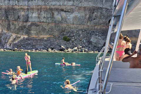 Puerto Rico, Grande Canarie : excursion en bateau, boissons, repas, paddle surf, plongée avec tuba.Profitez du paddle surf et de la plongée avec tuba dans les criques de Grande C