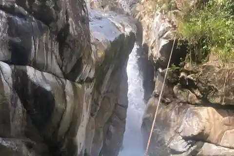 CANYONING and COFFEE TOUR AT LOCAL FAMILY FARM from GUATAPE