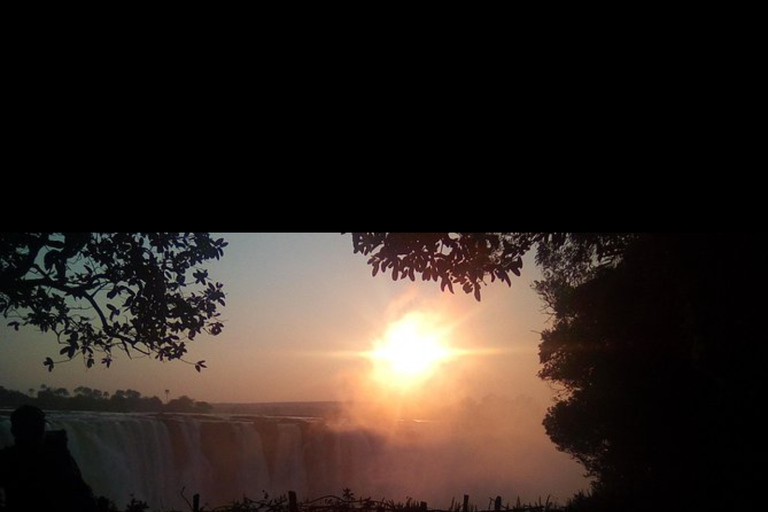 Victoria Falls Sunrise Guided Tour & Local Market Experience Victoria Falls: Sunrise Guided Tour with Souvenir Market