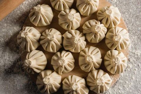 Tbilisi: Georgian Dinner, Wine & Folk Show with Pickup