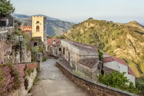 From Catania: Guided Godfather Tour with Taormina Visit