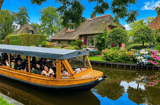 Ab Amsterdam: Tagestour nach Giethoorn & geführte Grachtenfahrt
