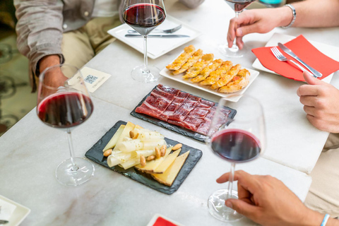 De Madri: vilarejos tradicionais, visita a vinícolas e almoço de tapasTour em inglês