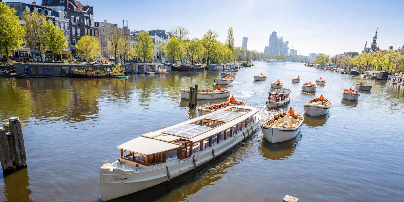 Amsterdam: Luxury Canal Cruise with Unlimited Drinks & Bites