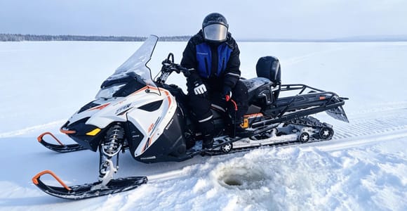 Saariselkä: Full Day Snowmobiling & Ice Fishing with BBQ