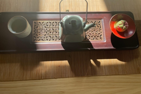 Cérémonie du thé chinois dans la cour du Hutong de PékinClient du thé
